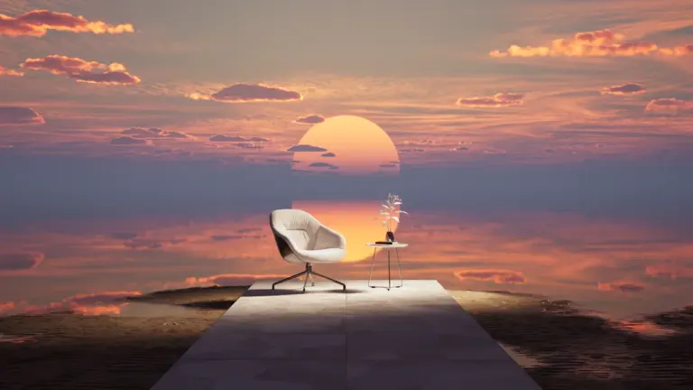 Ein weißer Sessel auf einem Holzsteg bei einem malerischen Sonnenuntergang über dem Wasser.